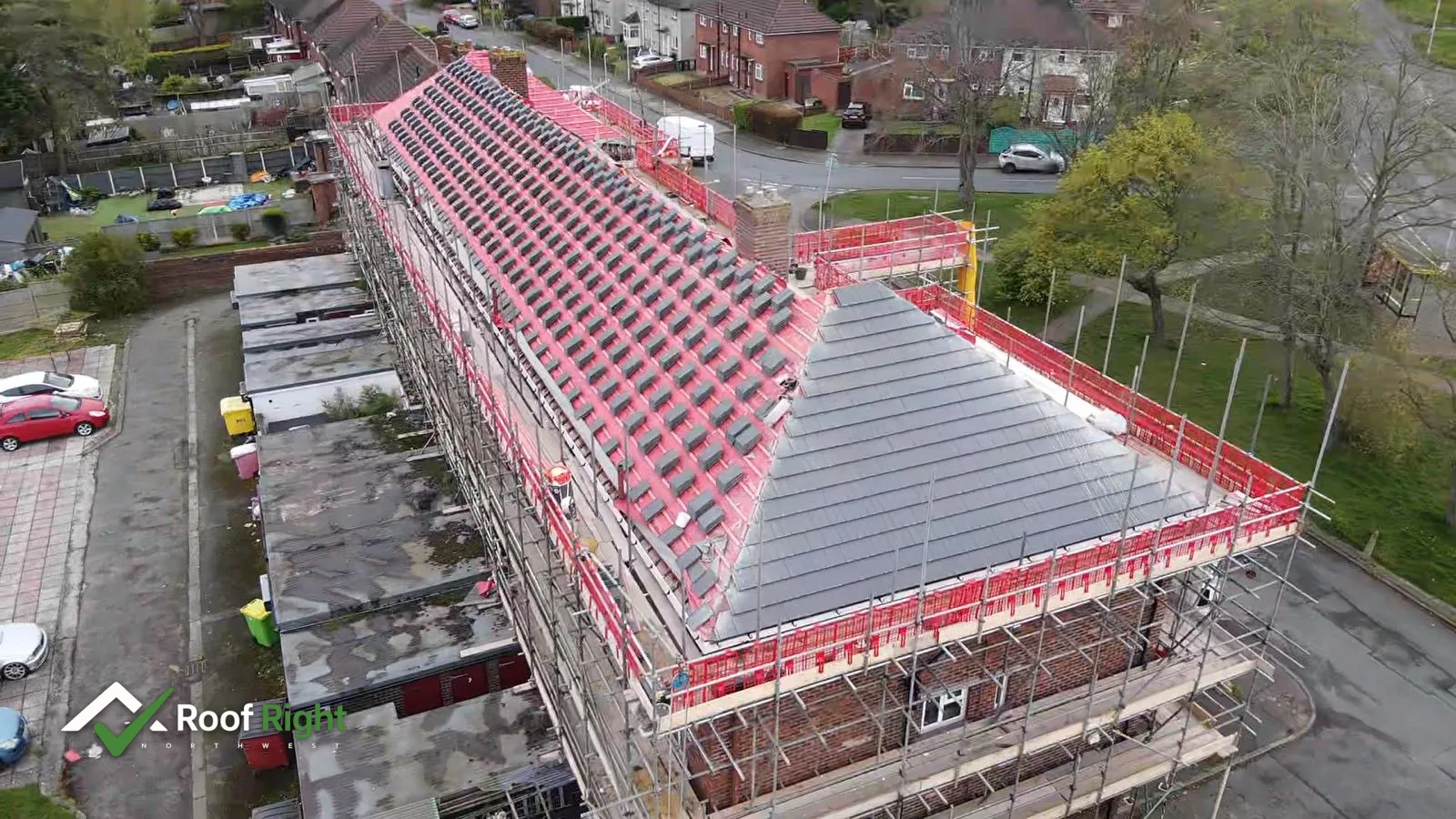 Large scale reroof in progress, aerial view